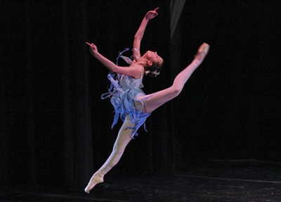Ballet dancer in mid leap