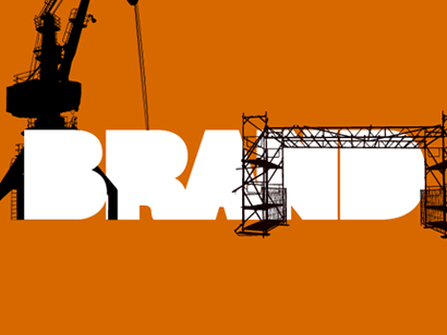 Construction workers assembling the word BRAND