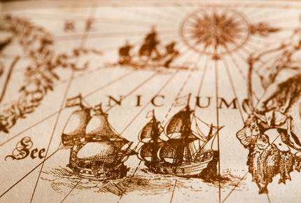 Detail of two ships and compass from antique map