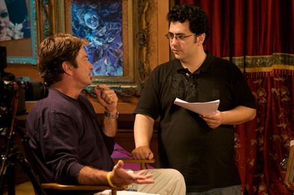 Biagio talking to a colleague on set.