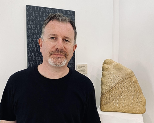 Mark McGuinness with Elegy for Moss stone sculpture