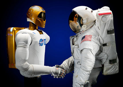NASA robot and astronaut shaking hands