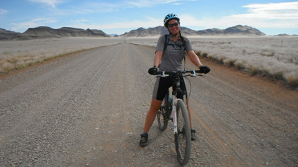 Natalie cycling in Africa
