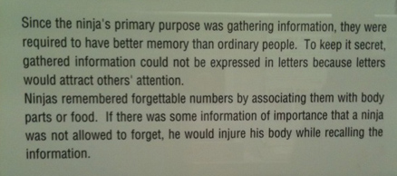Museum text explaining that ninjas used to remember numbers by associating them with parts of their body and for important information, injure their bodies while recalling the information. 