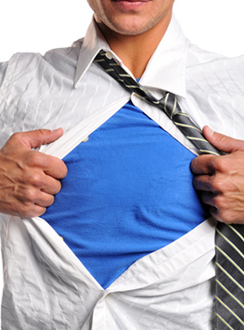Man opening shirt to reveal superhero costume