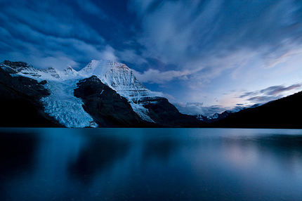 Mountain reflected in lake, at twilight